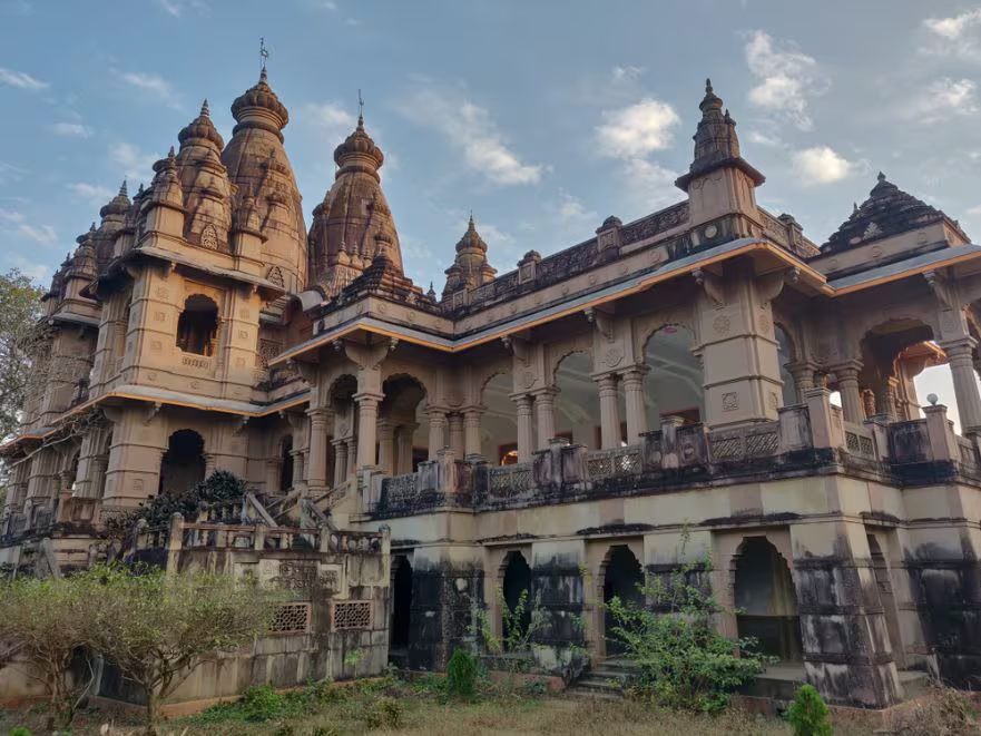 A carved stone temple with tiered spires in Deoghar, Jharkhand.
